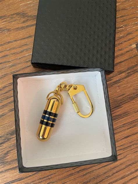 ysl vintage keychain|yves saint laurent keychain.